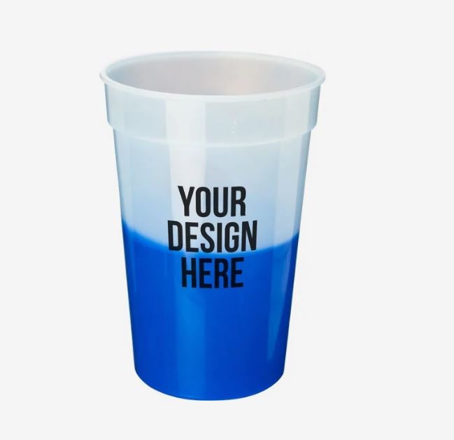 A photo showing a blue plastic cup changing from frosted to bright blue, printed with YOUR DESIGN HERE.