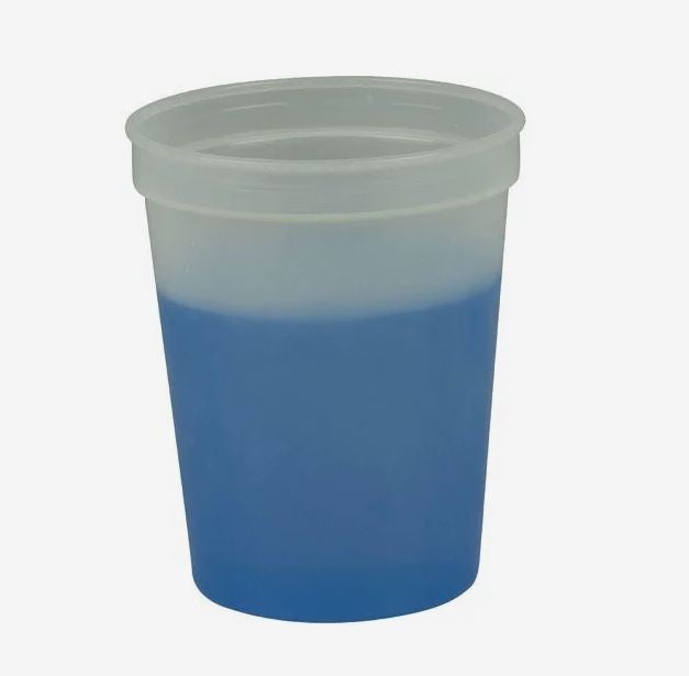 A photo showing a plastic cup changing from frosted to blue.