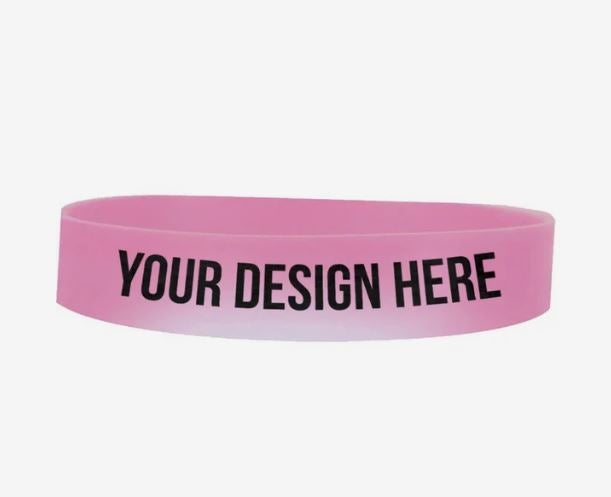 A photo showing a plastic bracelet changing from pink to clear, printed with YOUR DESIGN HERE.