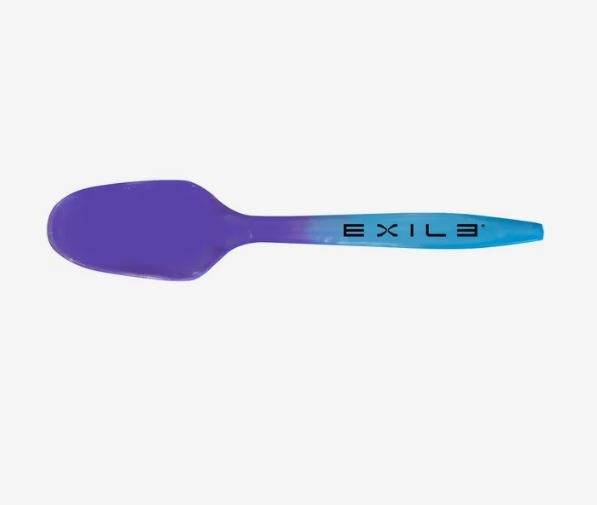 A photo of a blue plastic spoon changing to purple.