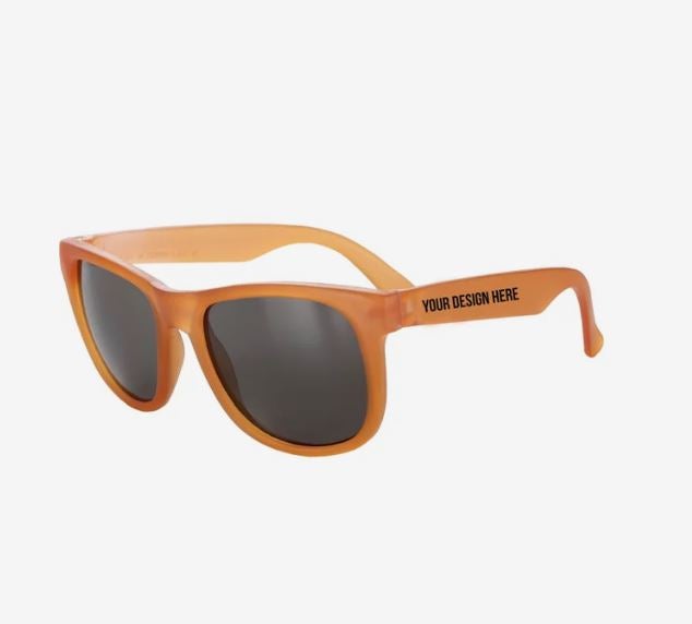 A photo of a pair of clear sunglasses turning orange.