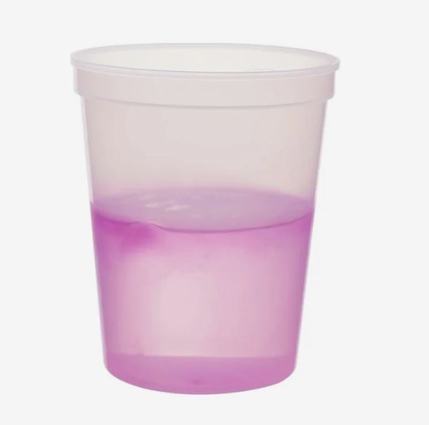 A photo of a plastic cup changing to pink.