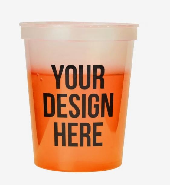A photo of a plastic cup changing to orange, with YOUR DESIGN HERE printed on the front.