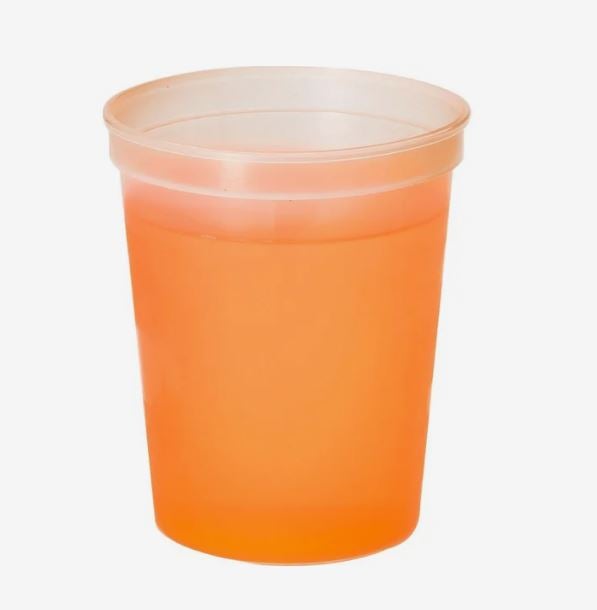 A photo of a plastic cup turning orange.
