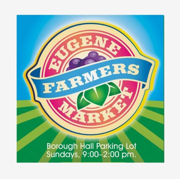 An ad for Eugene Farmers Market showing a bright blue sky and neatly striped fields, with contact info at the bottom.