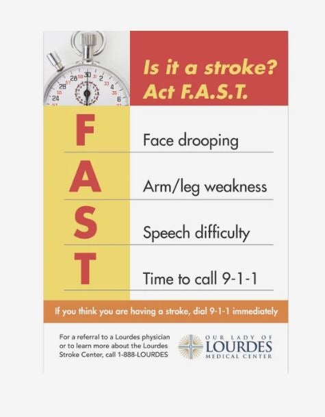 A photo showing a rectangular magnet in a portrait orientation. It's an ad for Our Lady of Lourdes Medical Center and it lists the Act FAST stages of responding to a stroke.