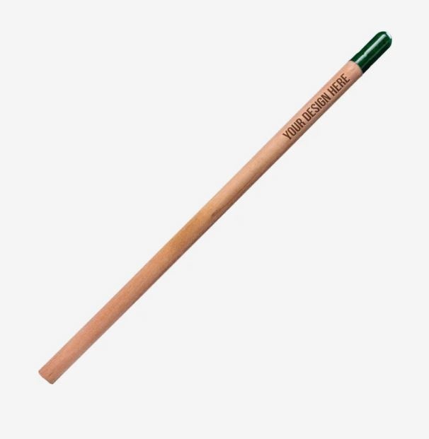 A photo showing an unsharpened wooden pencil with YOUR DESIGN HERE printed on the barrel, and a dark green seed capsule at the end.