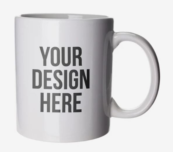 A photo of a white mug with YOUR DESIGN HERE printed on it.
