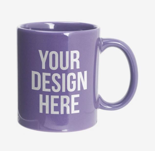 A photo of a purple mug with YOUR DESIGN HERE printed on it.