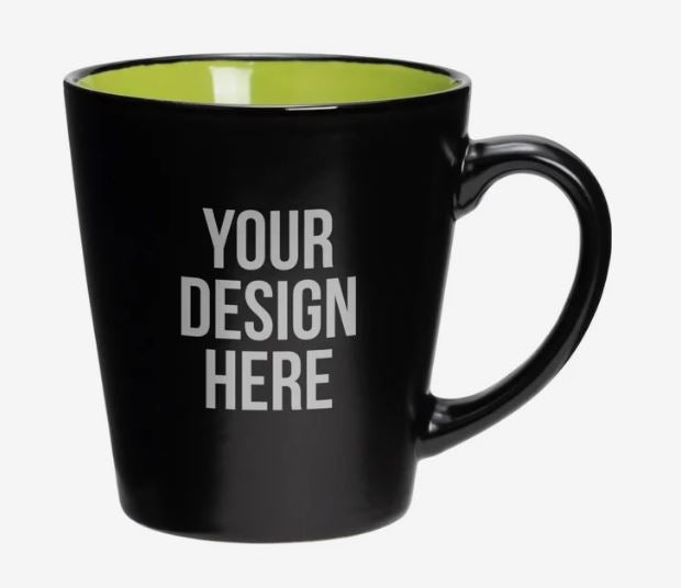 A photo of a black mug with a green inside and with YOUR DESIGN HERE printed on it.