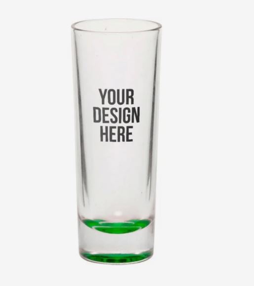 A photo of a tall shot glass with a green bottom and with YOUR DESIGN HERE printed on it.