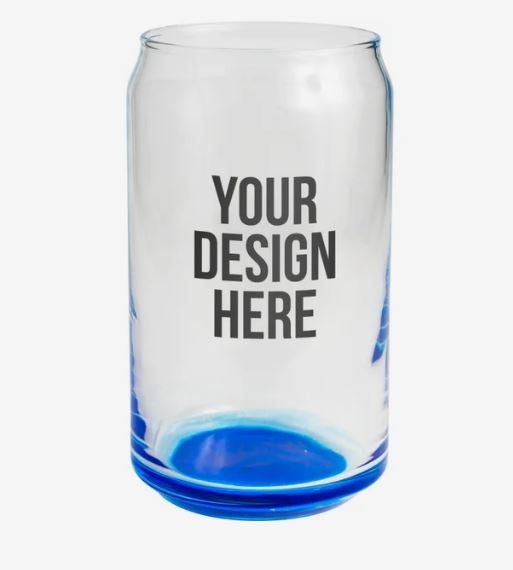 A photo of a can-shaped glass with a blue bottom and with YOUR DESIGN HERE printed on it.