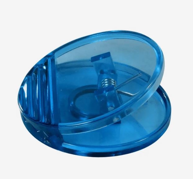 A photo of a round blue transparent plastic clip