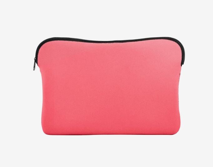 A photo of a coral pink foam laptop sleeve with a black zipper.