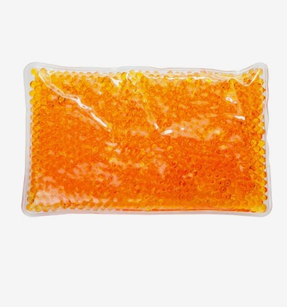 A photo of an orange rectangular gel bead hot/cold pack.