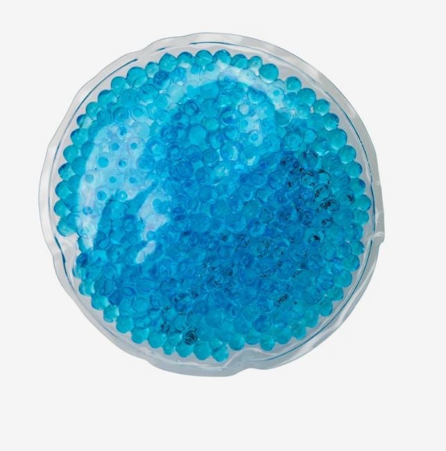 A photo of a blue circle gel bead hot/cold pack.