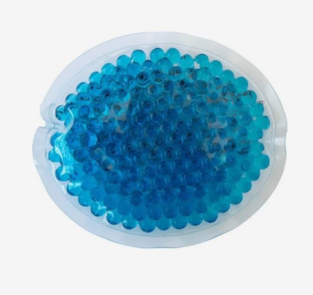 A photo of a blue oval gel bead hot/cold pack.