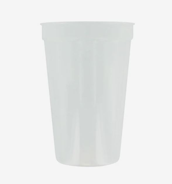 A photo of a glow in the dark cup that appears white.