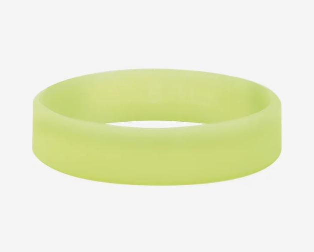 A photo of a glow in the dark silicone wristband.