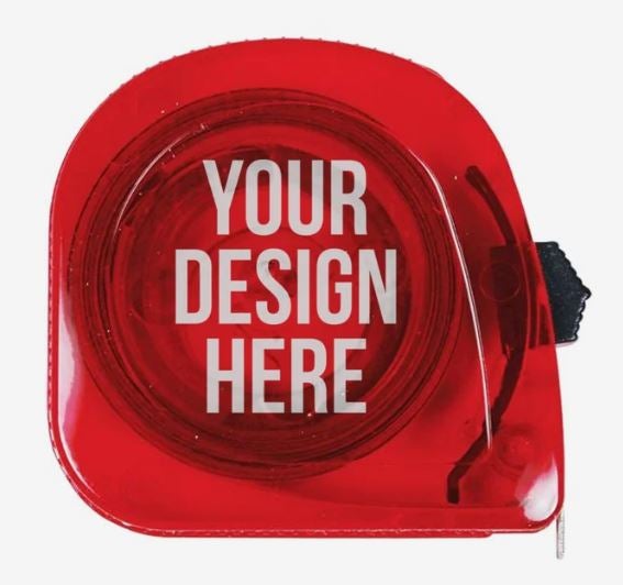 A photo of a transparent plastic red tape measure with YOUR DESIGN HERE printed on it in white.