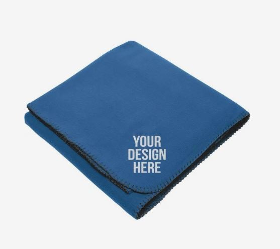 A photo of a folded blue fleece blanket with YOUR DESIGN HERE in white on the corner.