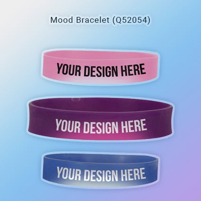 A photo showing plastic bracelets changing from colored to white when activated by heat.