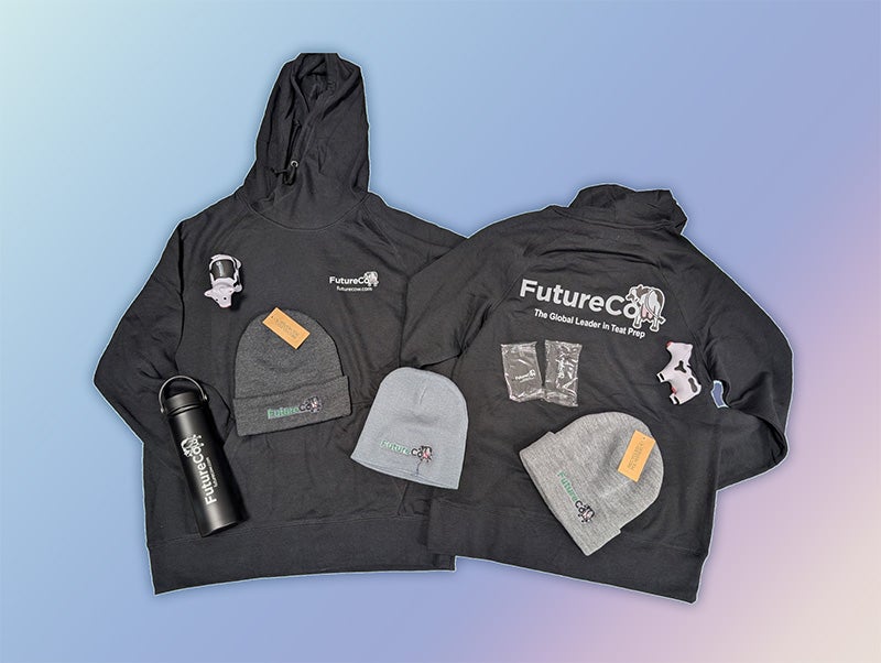 A collage photo showing swag customized with the FutureCow logo. There are two dark grey hoodies, two cow stress toys, three grey beanies, camo koozies, and a black tumbler.