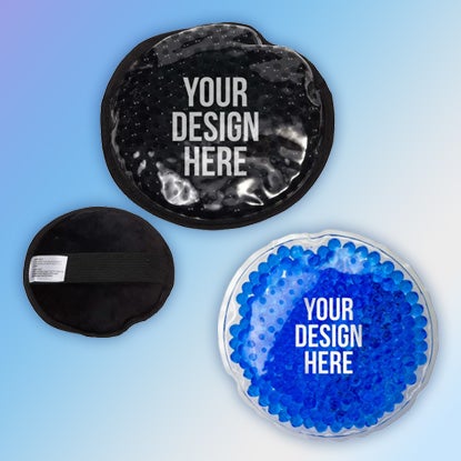 A photo showing a black circular hot/cold pack and a blue circular cold pack, with YOUR DESIGN HERE on the front in white.