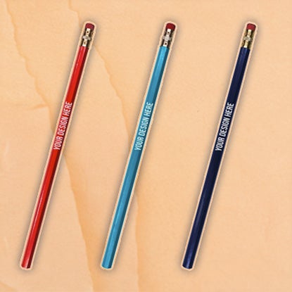 A collage showing three of the same pencil with a pink eraser at the end, in three different colors (red, turquoise, and dark blue.) They all have YOUR DESIGN HERE printed on the side in white.