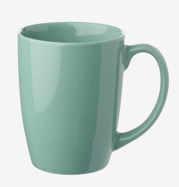 Glossy sage green ceramic coffee mug with a gently curved body, wide opening, and matching handle on the right.