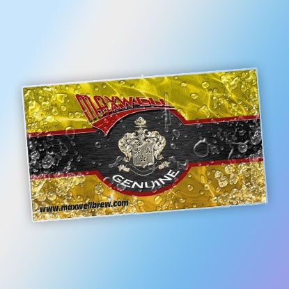 A photo of a rectangular magnet with an ad for Maxwell Genuine.