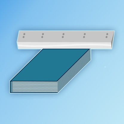 An illustration showing a stack of paper resting down the middle of a blue cover, then the cover being pushed up around the paper to form a book shape.