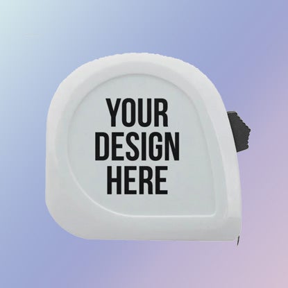 A photo of a white tape measure printed with YOUR DESIGN HERE.